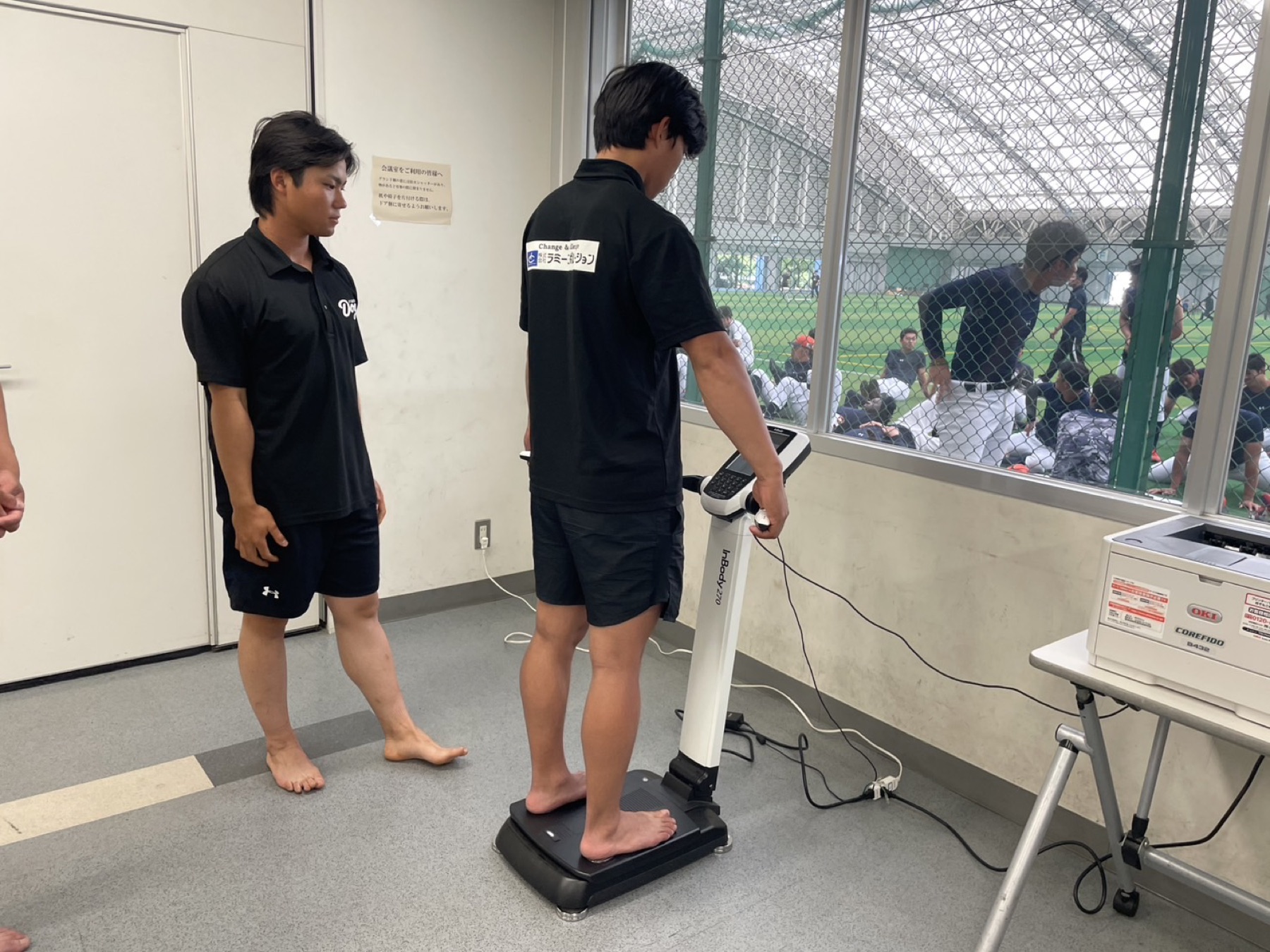 Player completing a body composition assessment