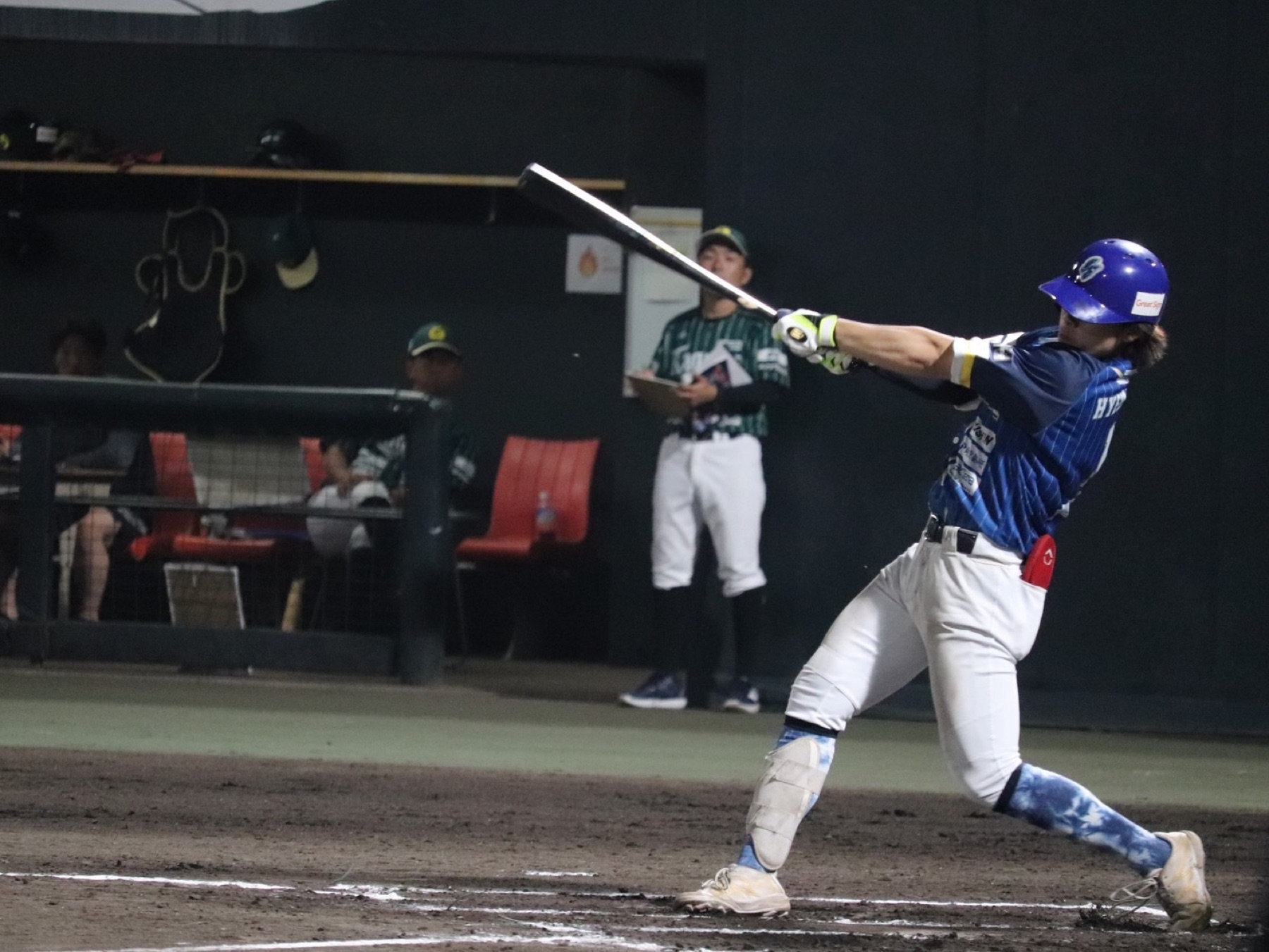 Tokushima IndigoSocks player batting under the lights